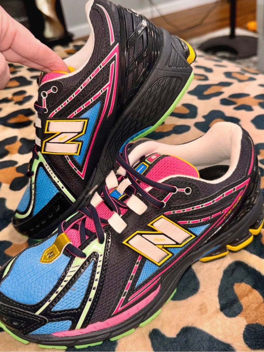 New Balance Women's Black, Pink, Blue & Yellow Neon Athletic Running Shoes.